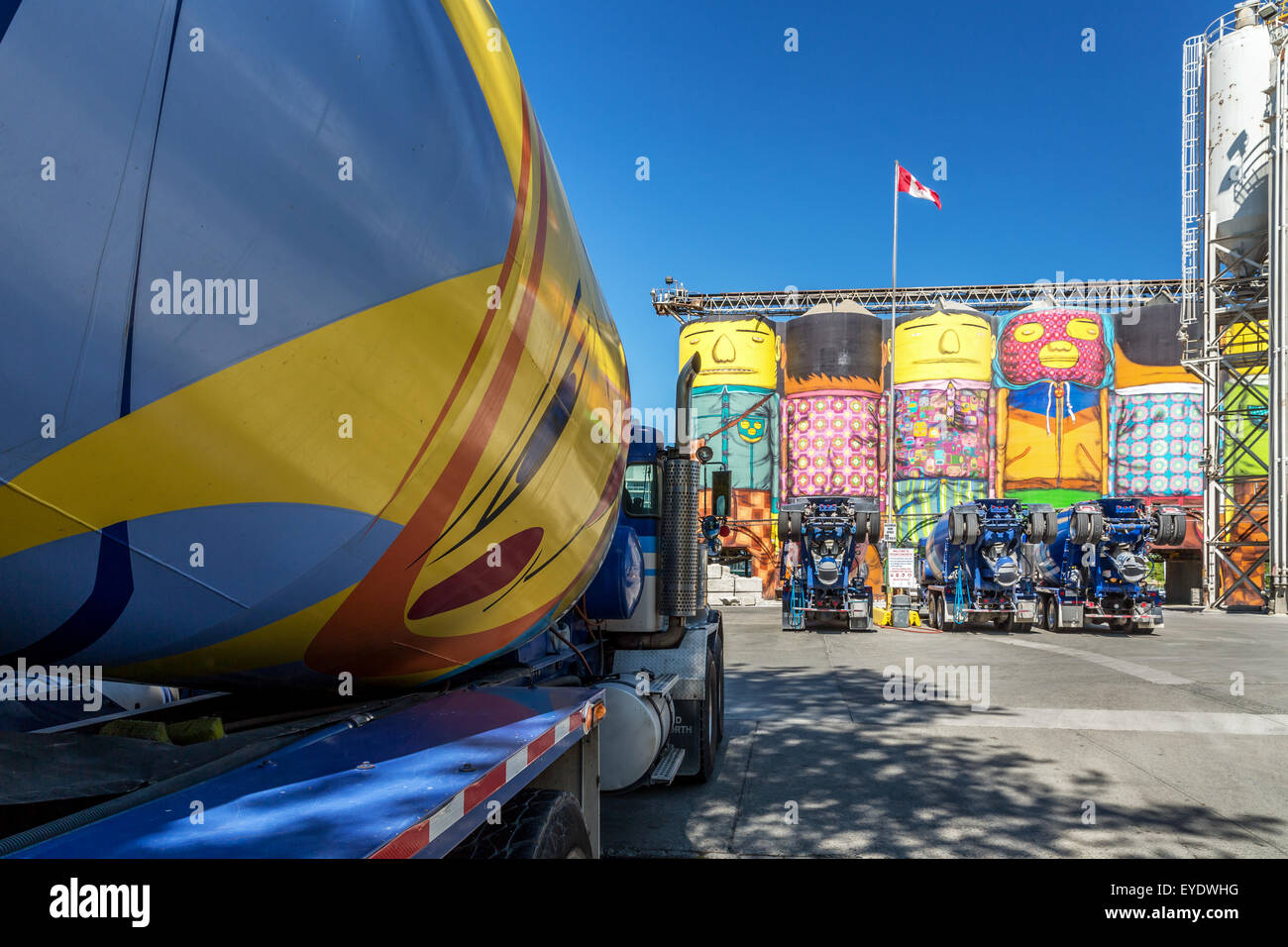Ocean Concrete silos painted by Os Gemeos, Granville Island, Vancouver, British Columbia, Canada Stock Photo