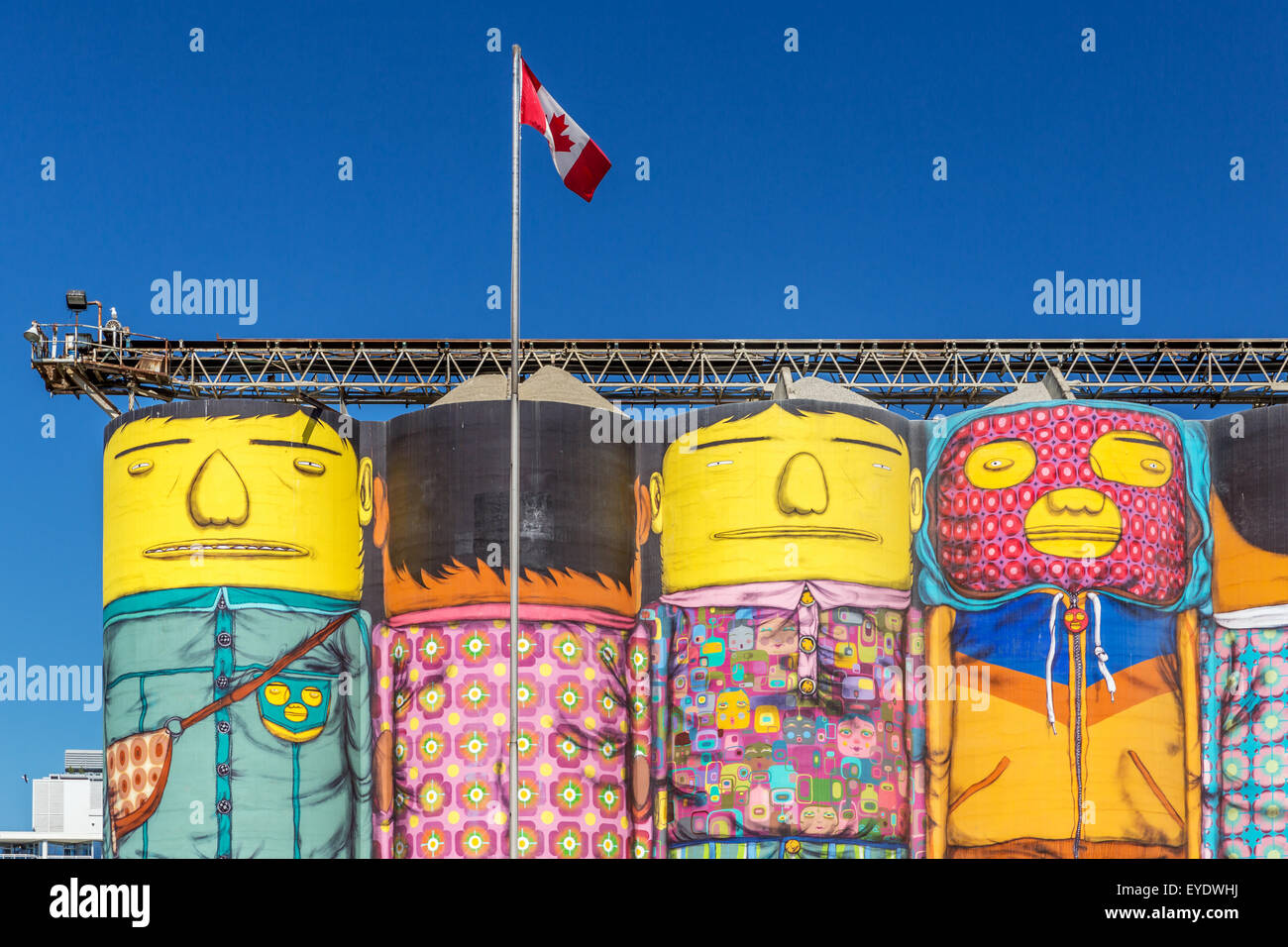 Ocean Concrete silos painted by Os Gemeos, Granville Island, Vancouver, British Columbia, Canada Stock Photo