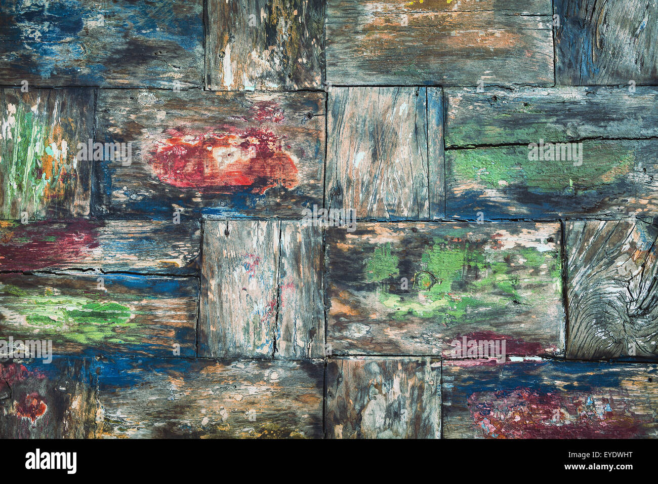 Vintage style, painted in various colors, damaged old teakwood table