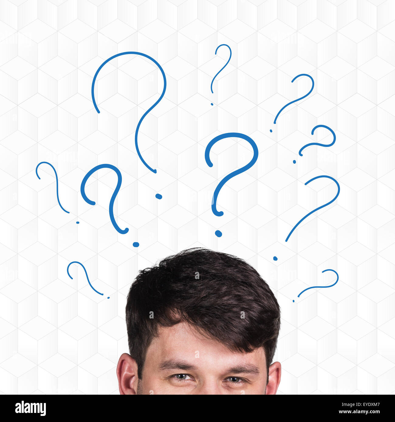 Businessman with question marks Stock Photo