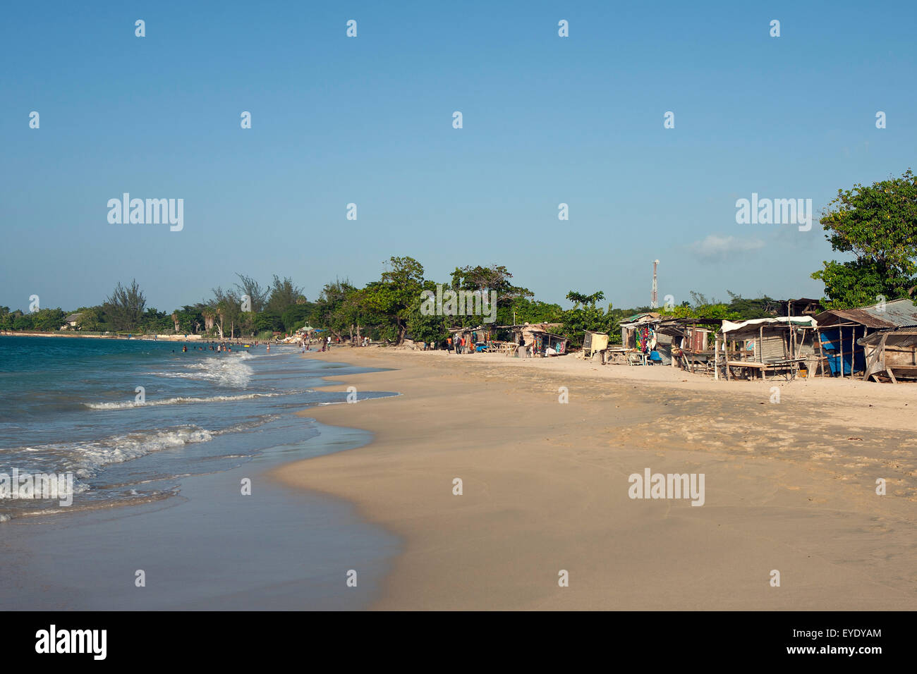 Vendors sell on a beach, Runaway Bay, St. Ann, Jamaica Stock Photo