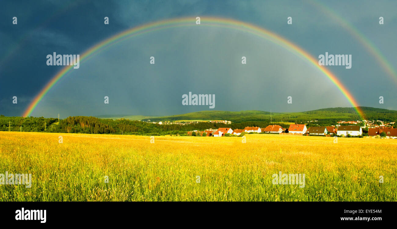 Regenbogen im Taunus, Landschaft  - Stock Photo