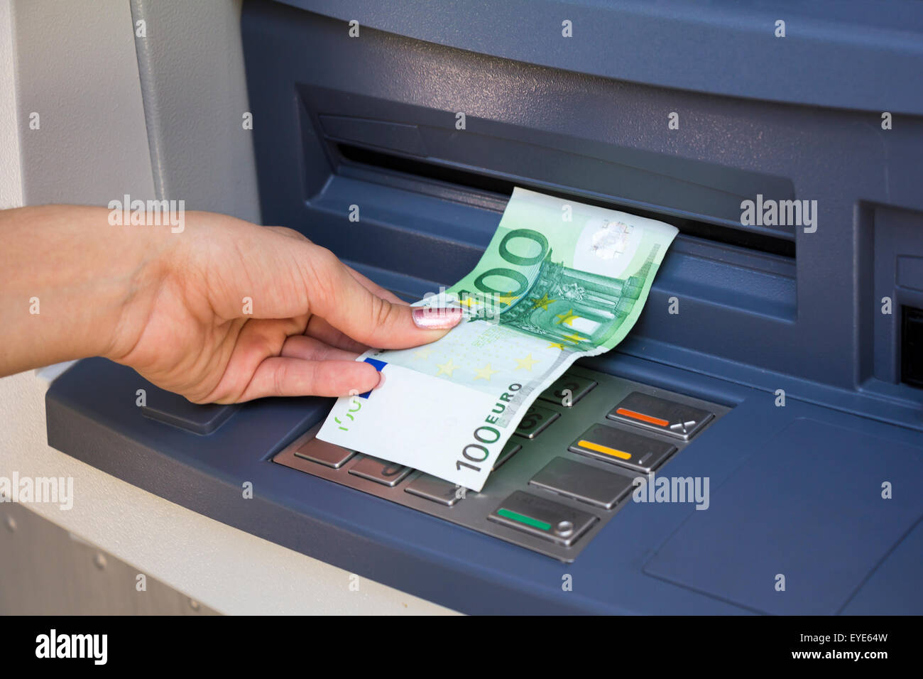 Withdrawal euro banknote on the cachsmachine Stock Photo