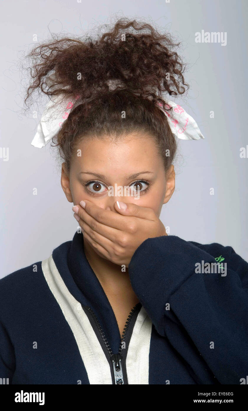 Afro Caribbean girl with shocked expression. Stock Photo