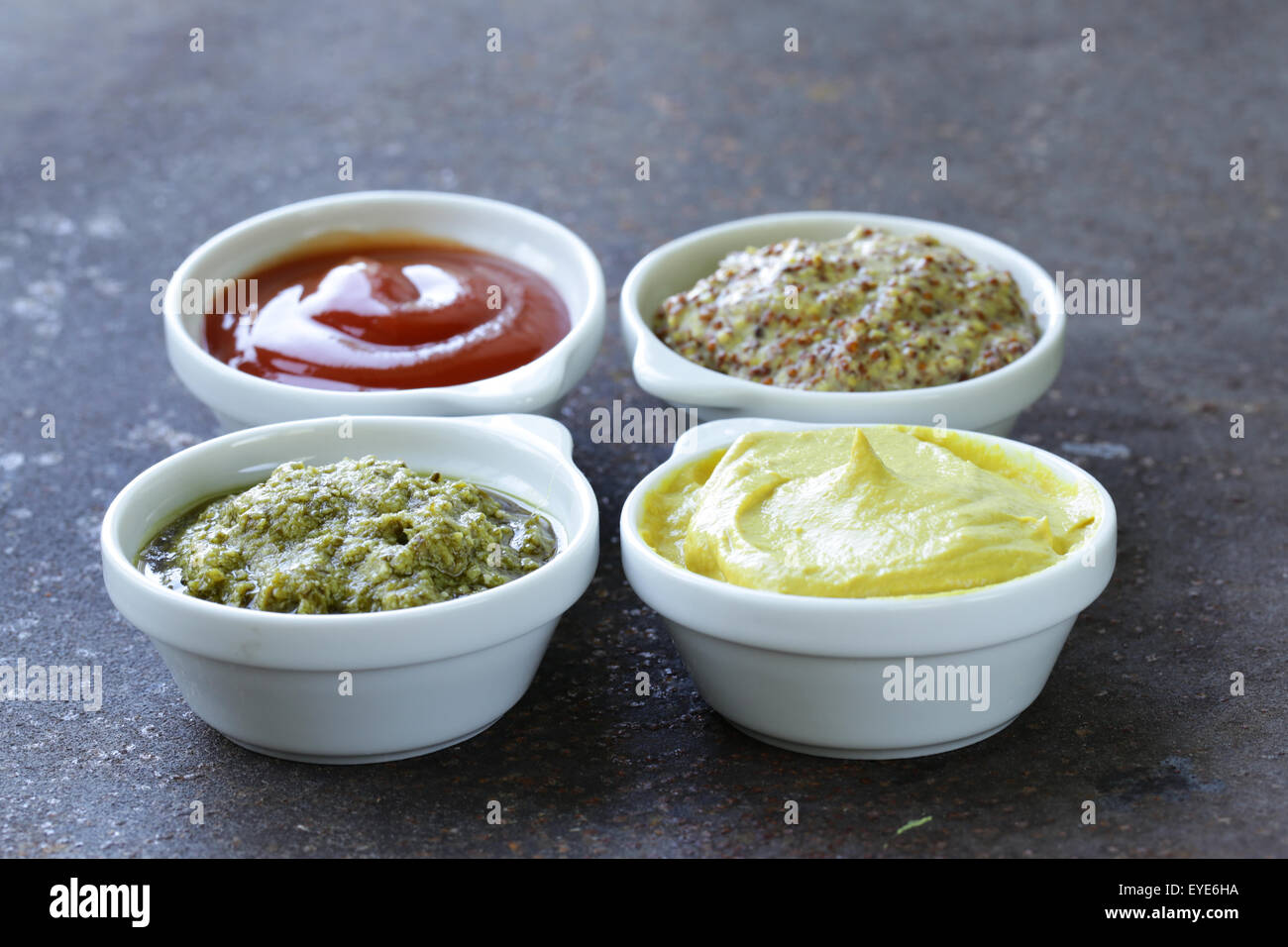 different types of sauces ketchup, mustard, pesto Stock Photo Alamy