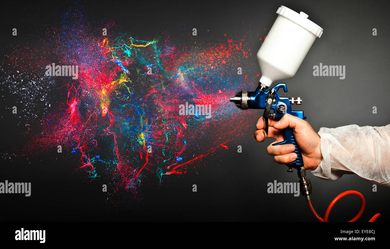 closeup image of hand hold spray gun Stock Photo