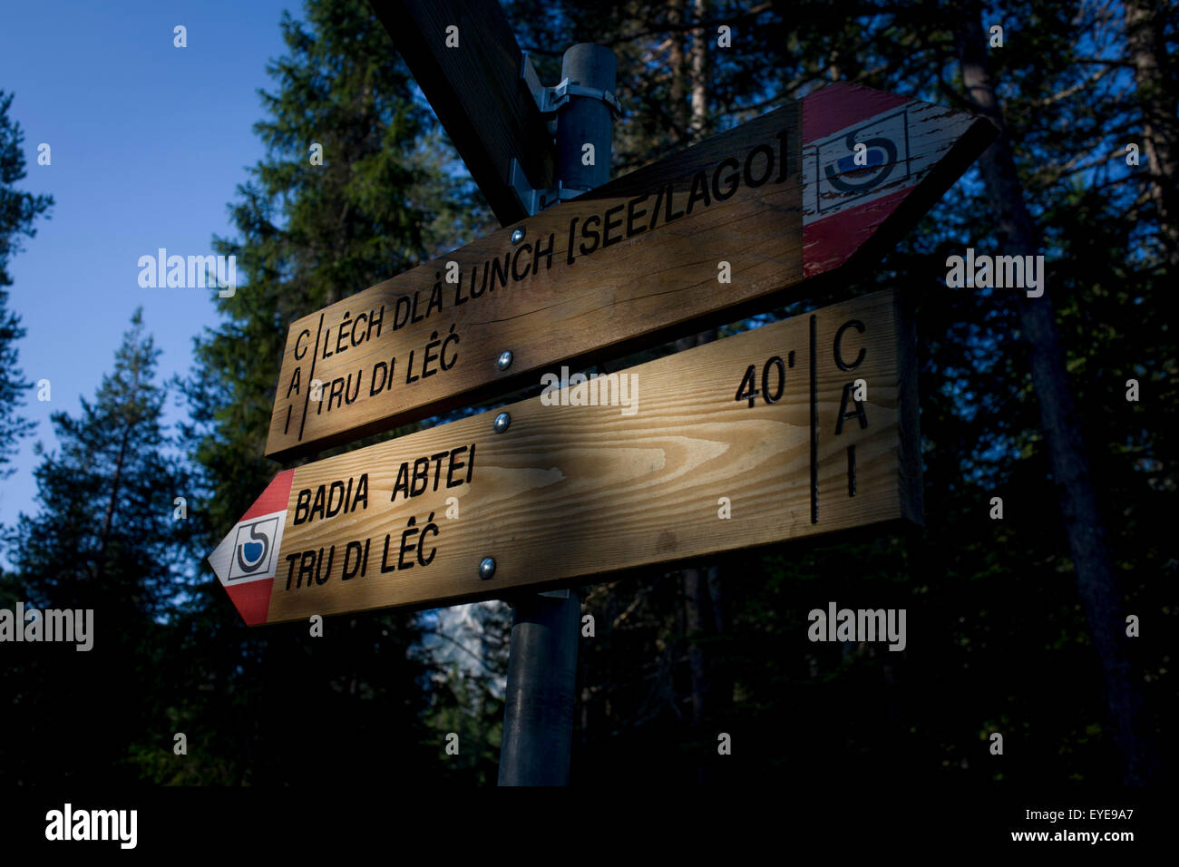 Hiking trails signpost near the rural lake 'Lêch della Lunch' in the Badia Dolomites, south Tyrol. Italy. Stock Photo