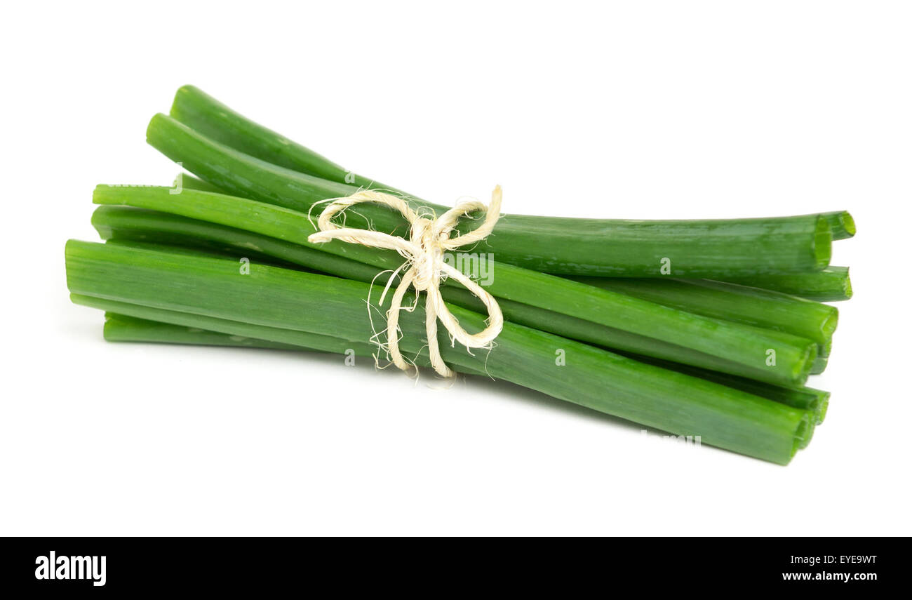Green onions on white background Stock Photo - Alamy