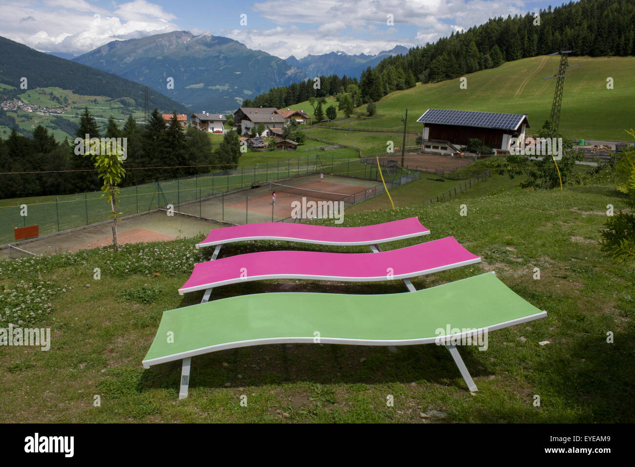 Vacant sun loungers at a health spa on the Jaufenpass, Dolomites, South Tyrol, Italy. Stock Photo