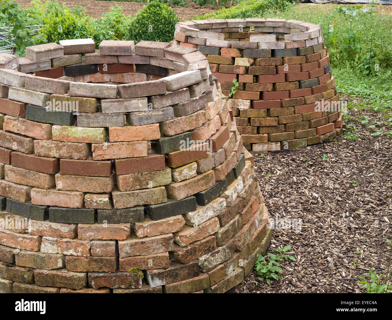 Old Victorian style brick compost bins, Barnsdale Gardens, England, UK. Stock Photo