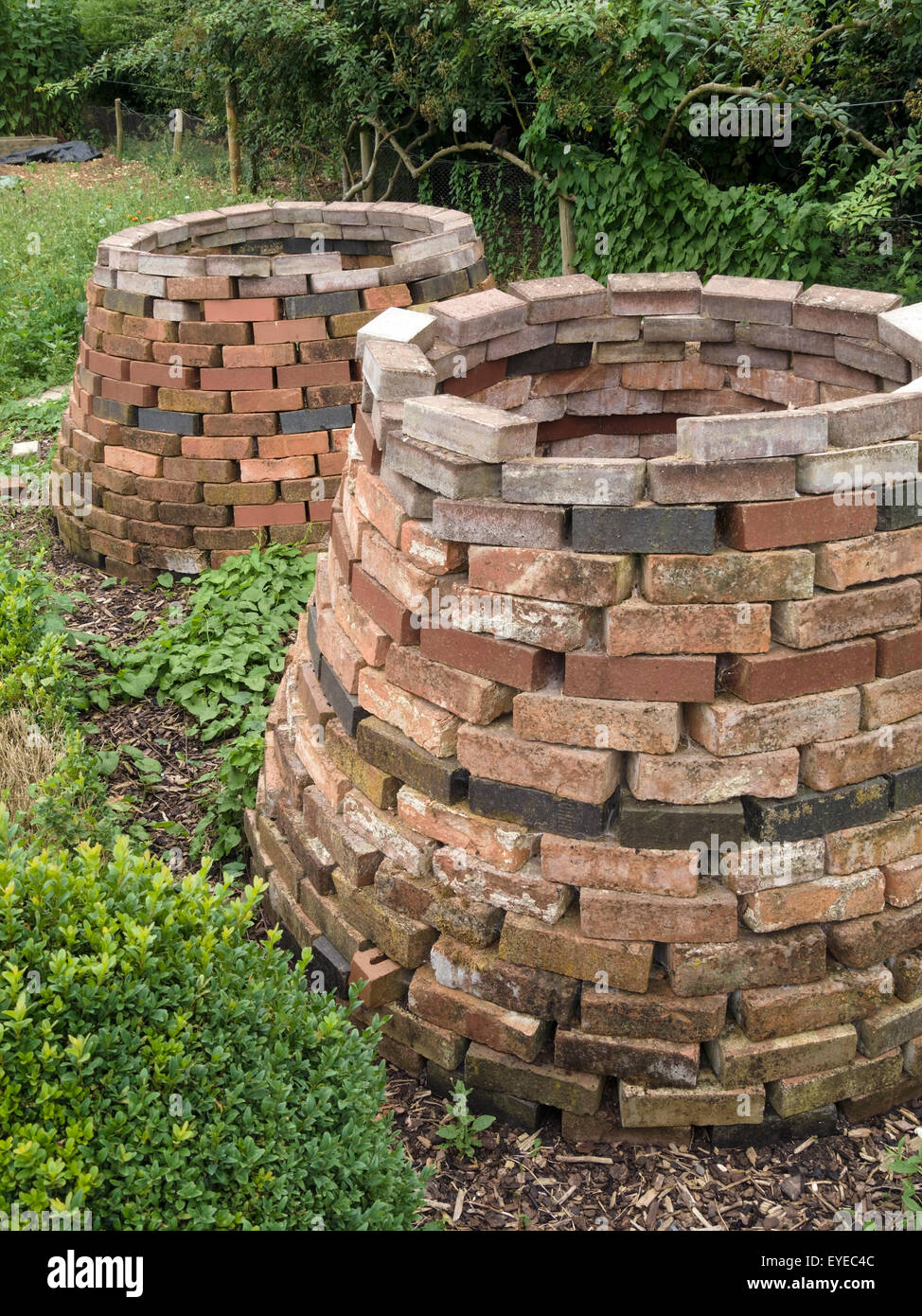 Old Victorian style brick compost bins, Barnsdale Gardens, England, UK. Stock Photo