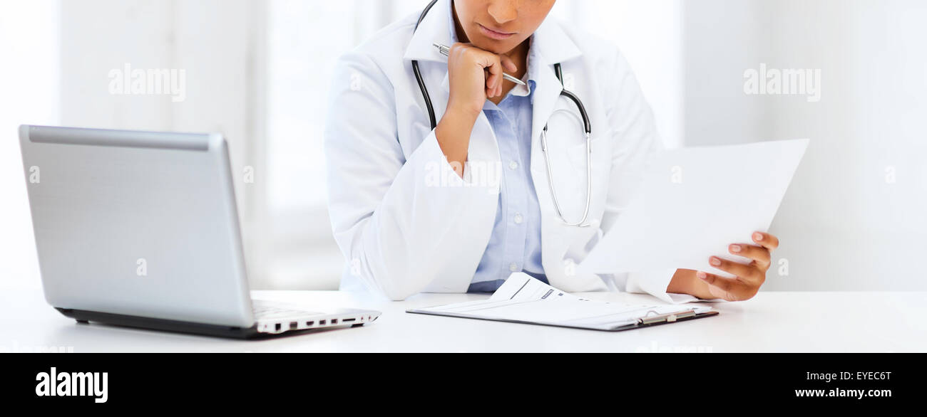 female doctor with laptop pc Stock Photo