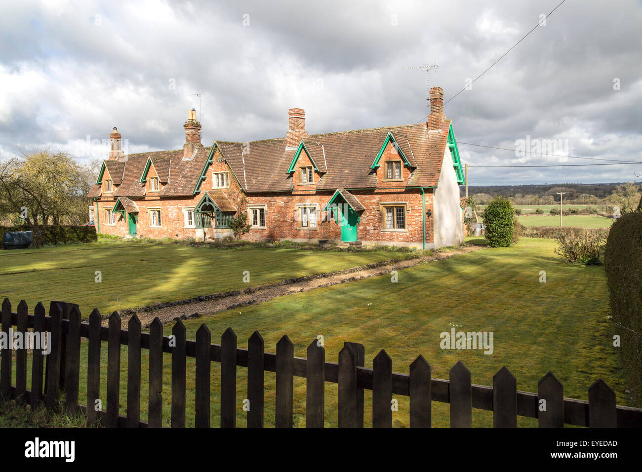 Traditional row of rural cottages in small terrace, Compton Bassett, Wiltshire, England, UK Stock Photo