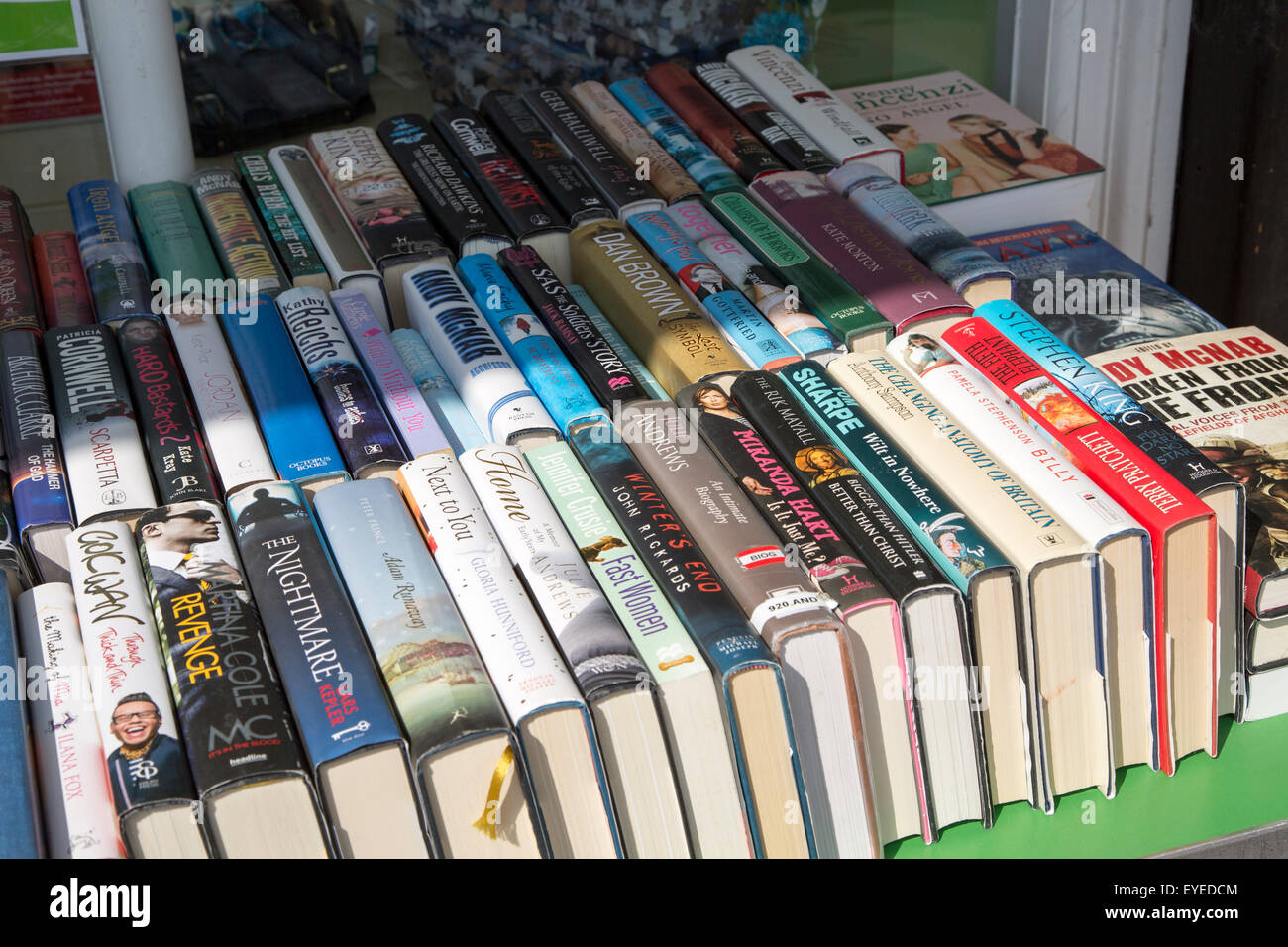 Close up of hard back books laid out on sale, UK Stock Photo
