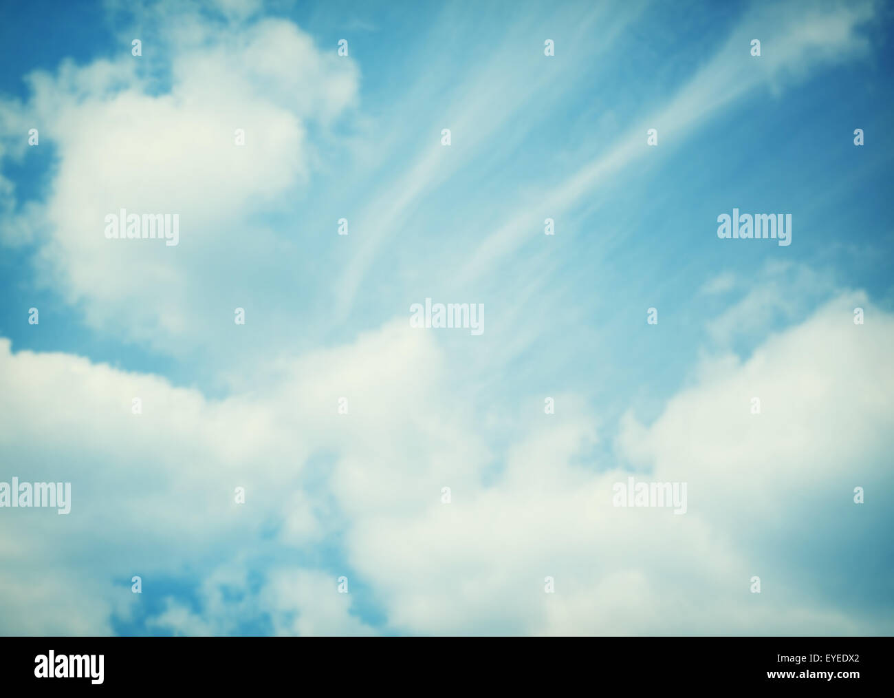 Blue sky clouds and sun light. Summer, spring time blurred background Stock Photo
