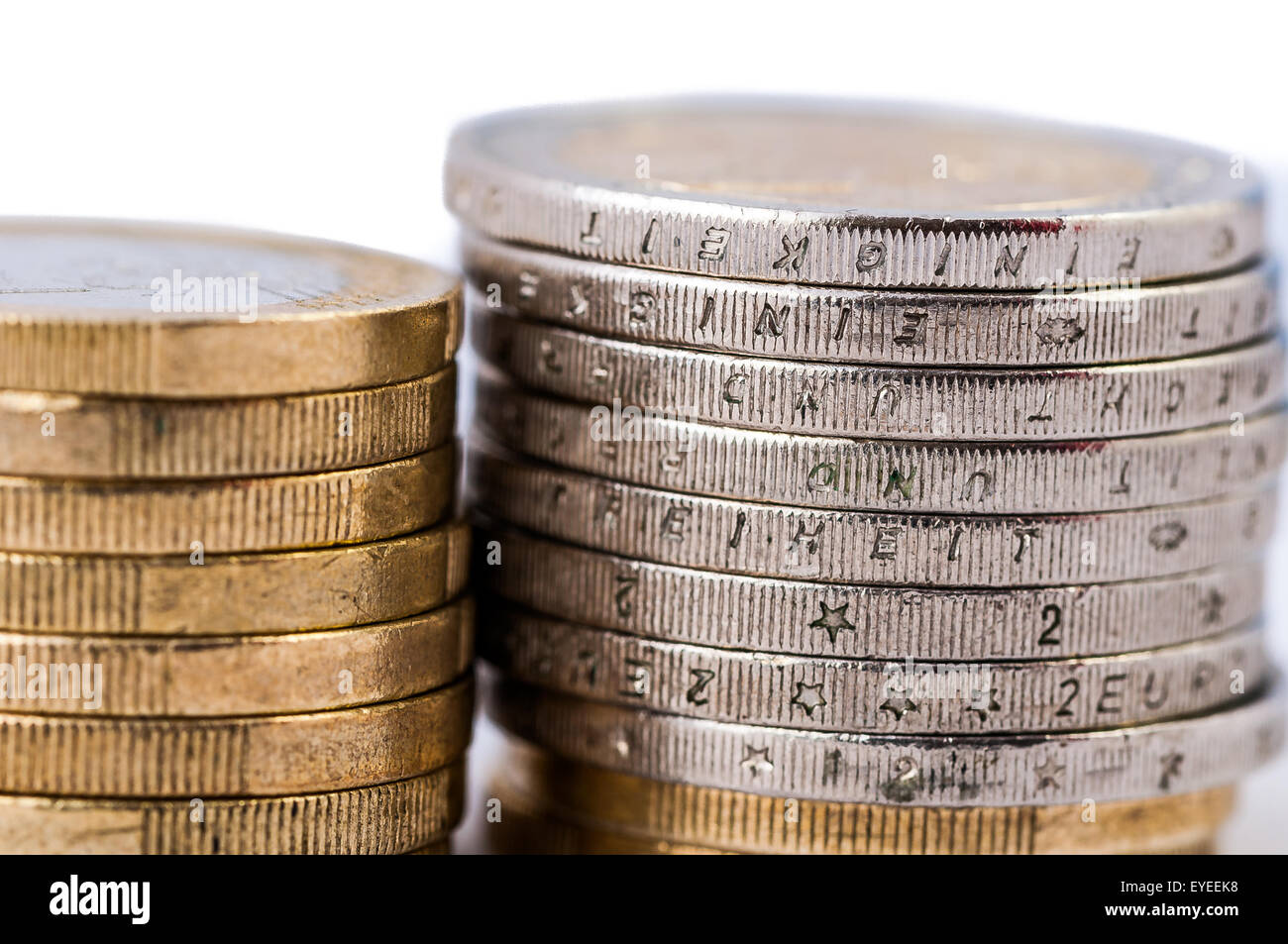 stack of coins on white background isolated Stock Photo - Alamy