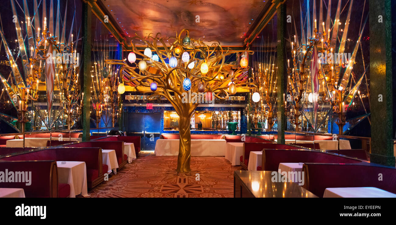 Tree sculpture inside a restaurant with formal dining; New York City