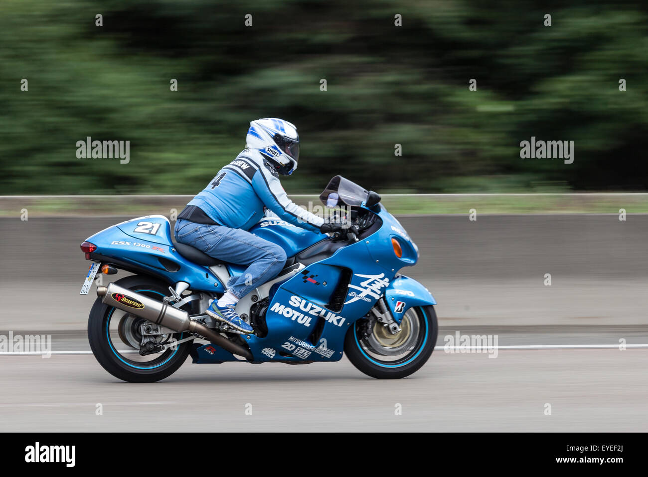 Suzuki Hayabusa GSX 1300 R motorcycle moving fast on the highway A5 near Frankfurt. July 26, 2015 in Frankfurt Main, Germany Stock Photo