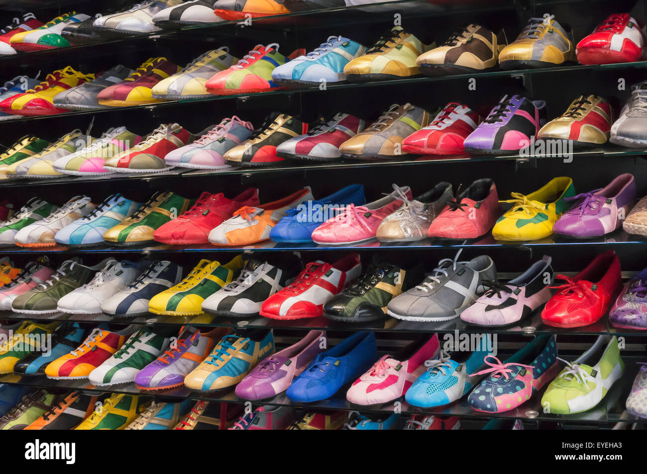 Display of brightly coloured shoes in a Nao outlet; Torremolinos, Spain  Stock Photo - Alamy