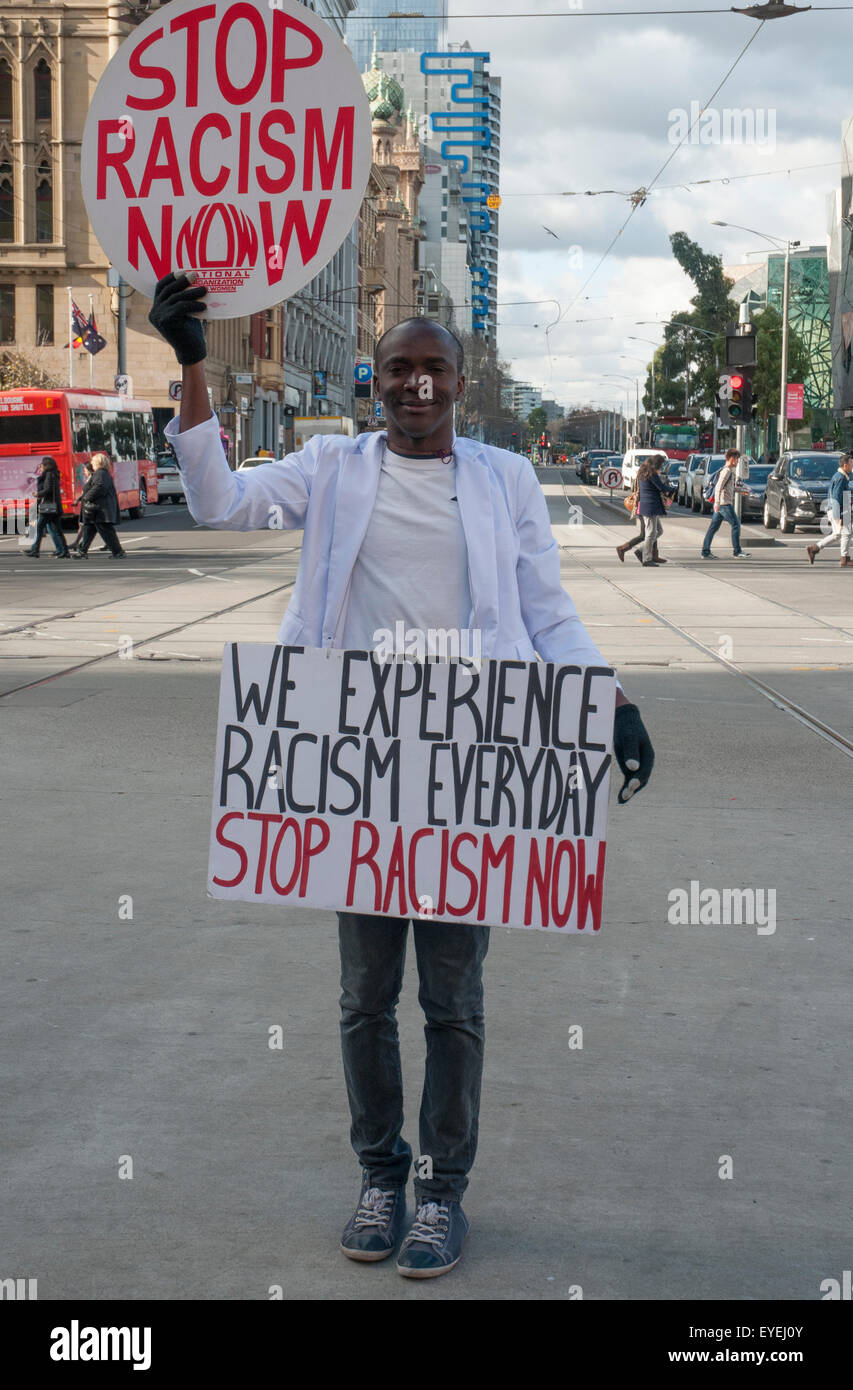 Melbourne, Australia. 27th July, 2015.  African-Australian man stages a one-man protest against racism. Credit:  Philip Game/Alamy Live News Stock Photo