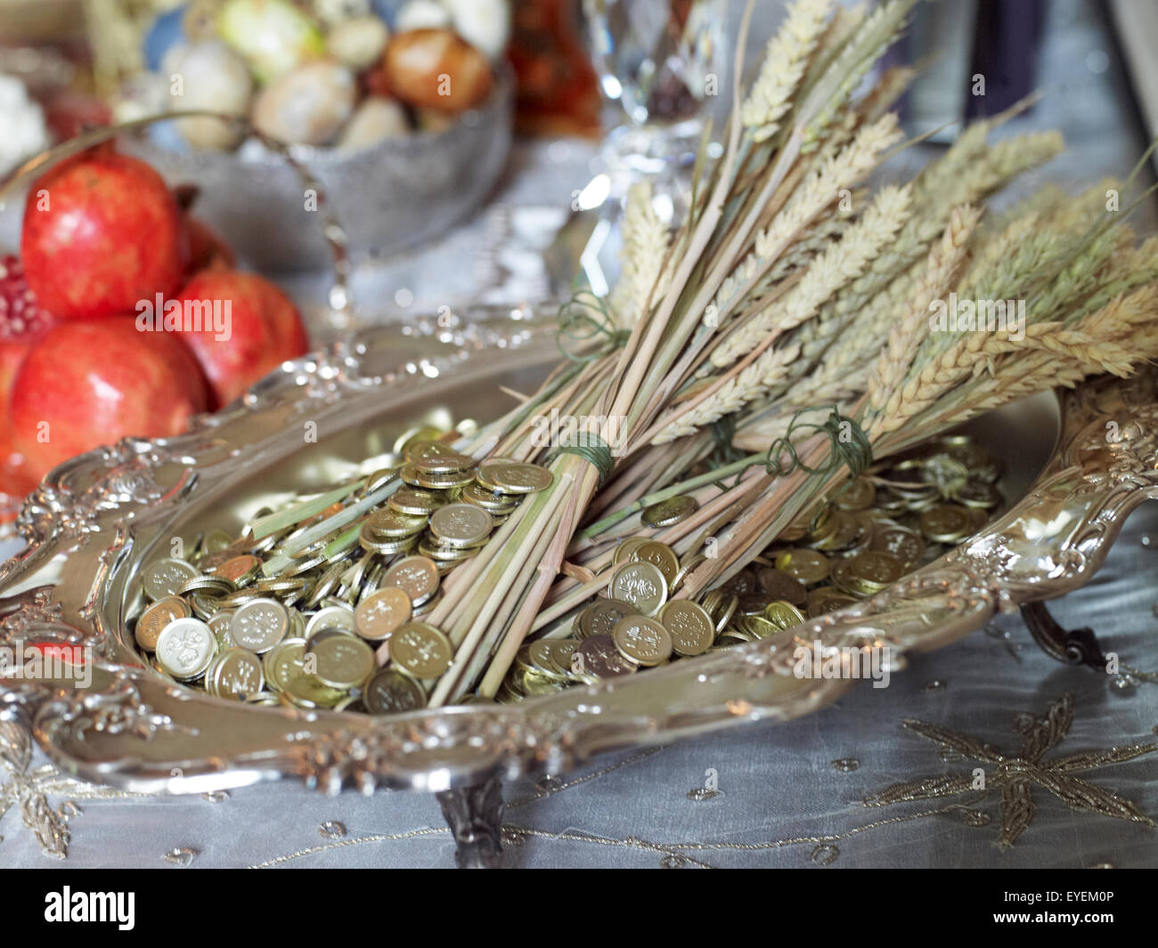 Persian celebration of gold wheat and coins Stock Photo