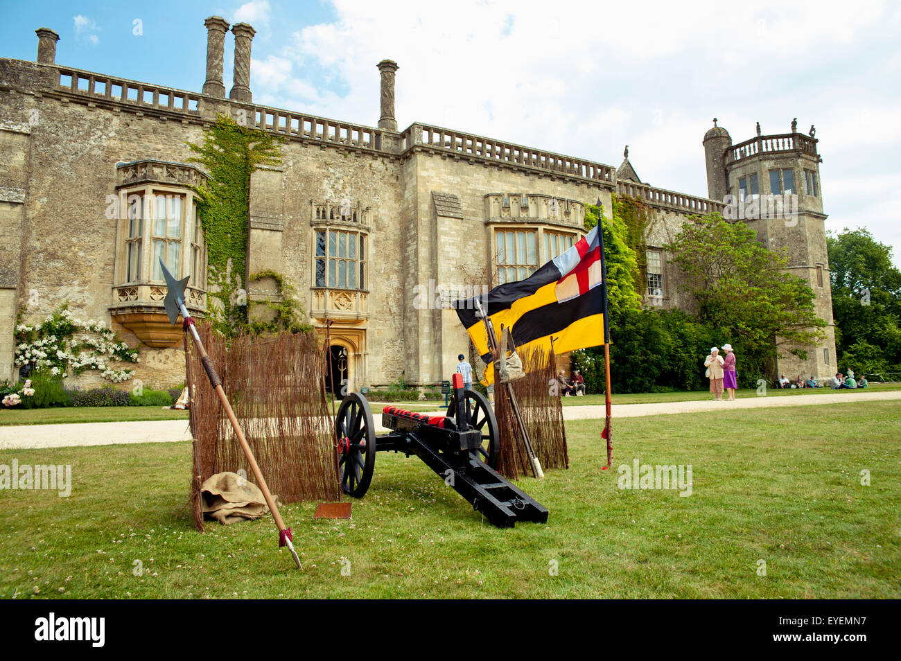 Cannon And Tourists In Front Of Lacock Abbey, Lacock, Wiltshire, Uk Stock Photo