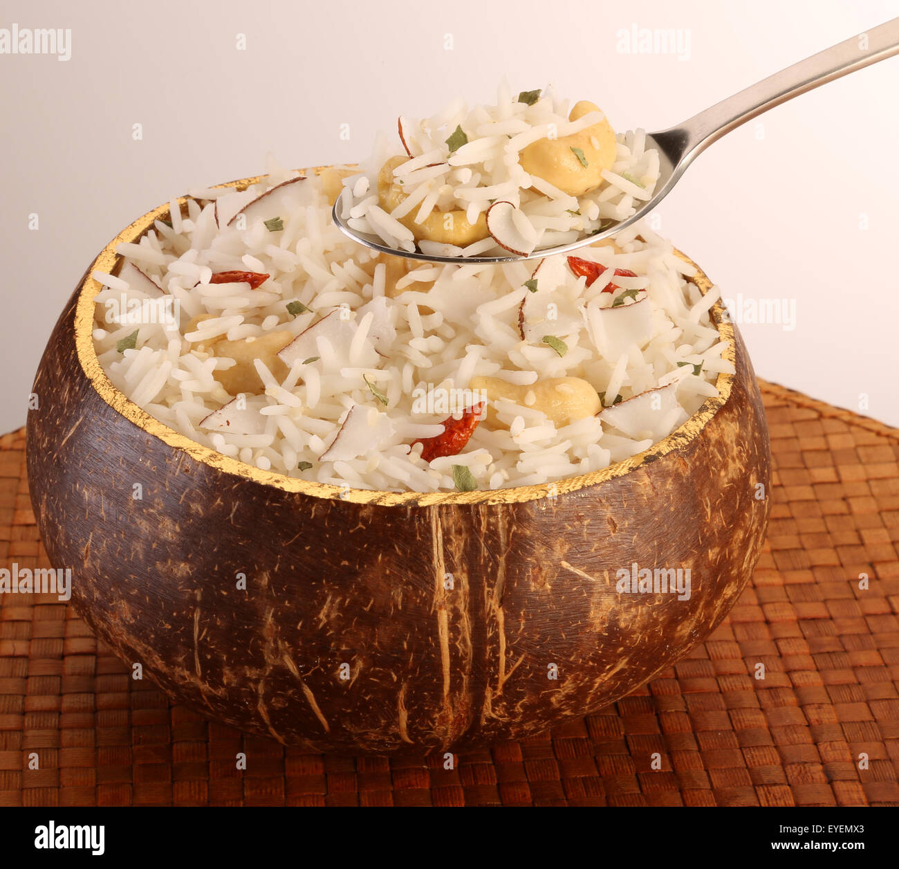 POLYNESIAN COCONUT RICE WITH SPOON Stock Photo