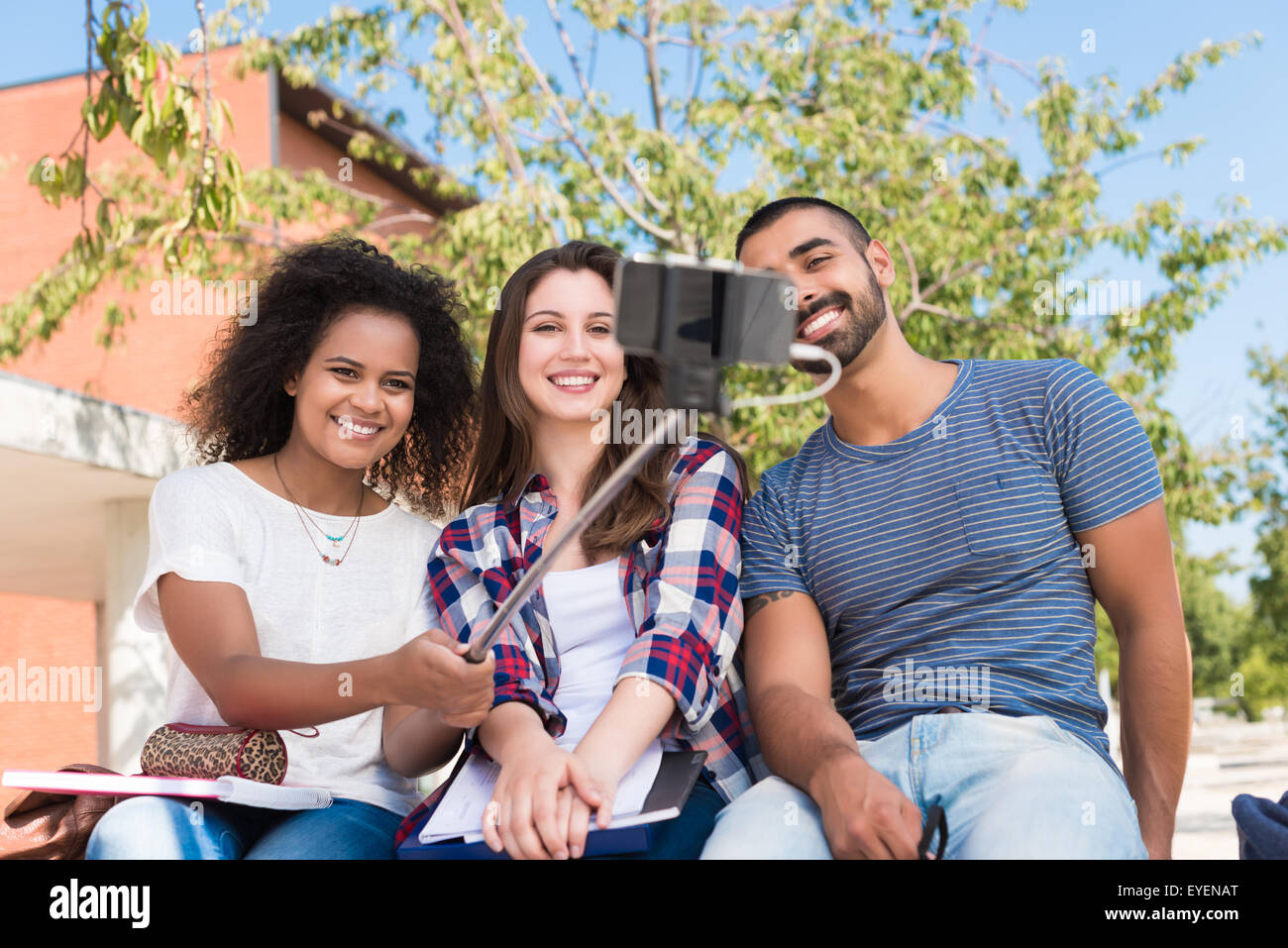 Group of students taking a selfie in school campus Stock Photo - Alamy