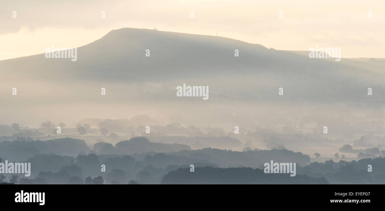 Titterstone Clee Hill overlooking Ludlow on a misty morning, Shropshire