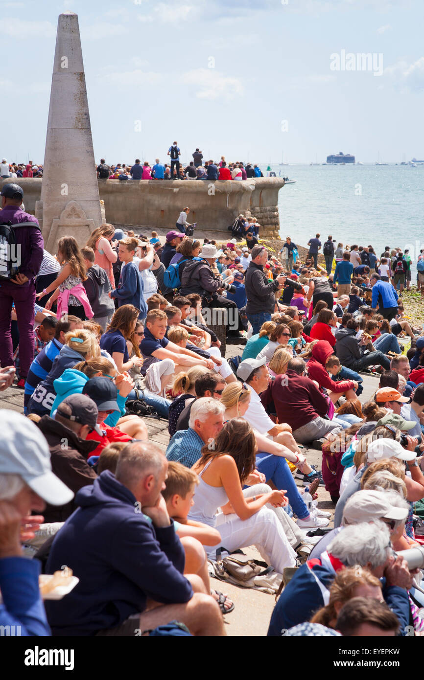 Crowds of people fill the beach to watch the Admirals Cup races off Portsmouth on Saturday 25 July 2015 Crowds gather on Southsea beach to watch the races Stock Photo