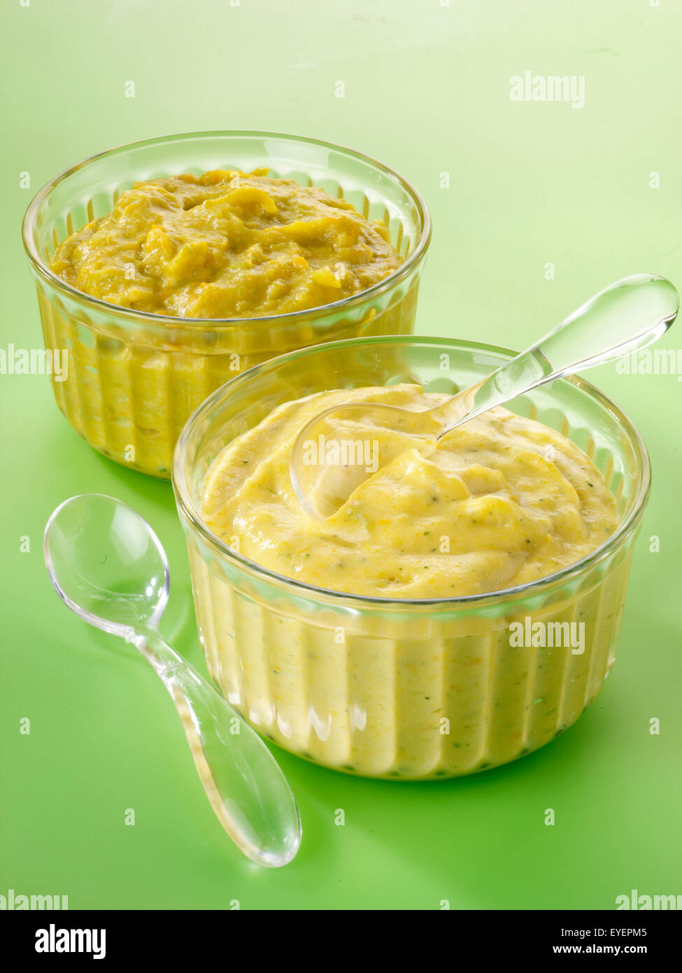 TWO DISHES OF FRESH PUREE BABY FOOD Stock Photo