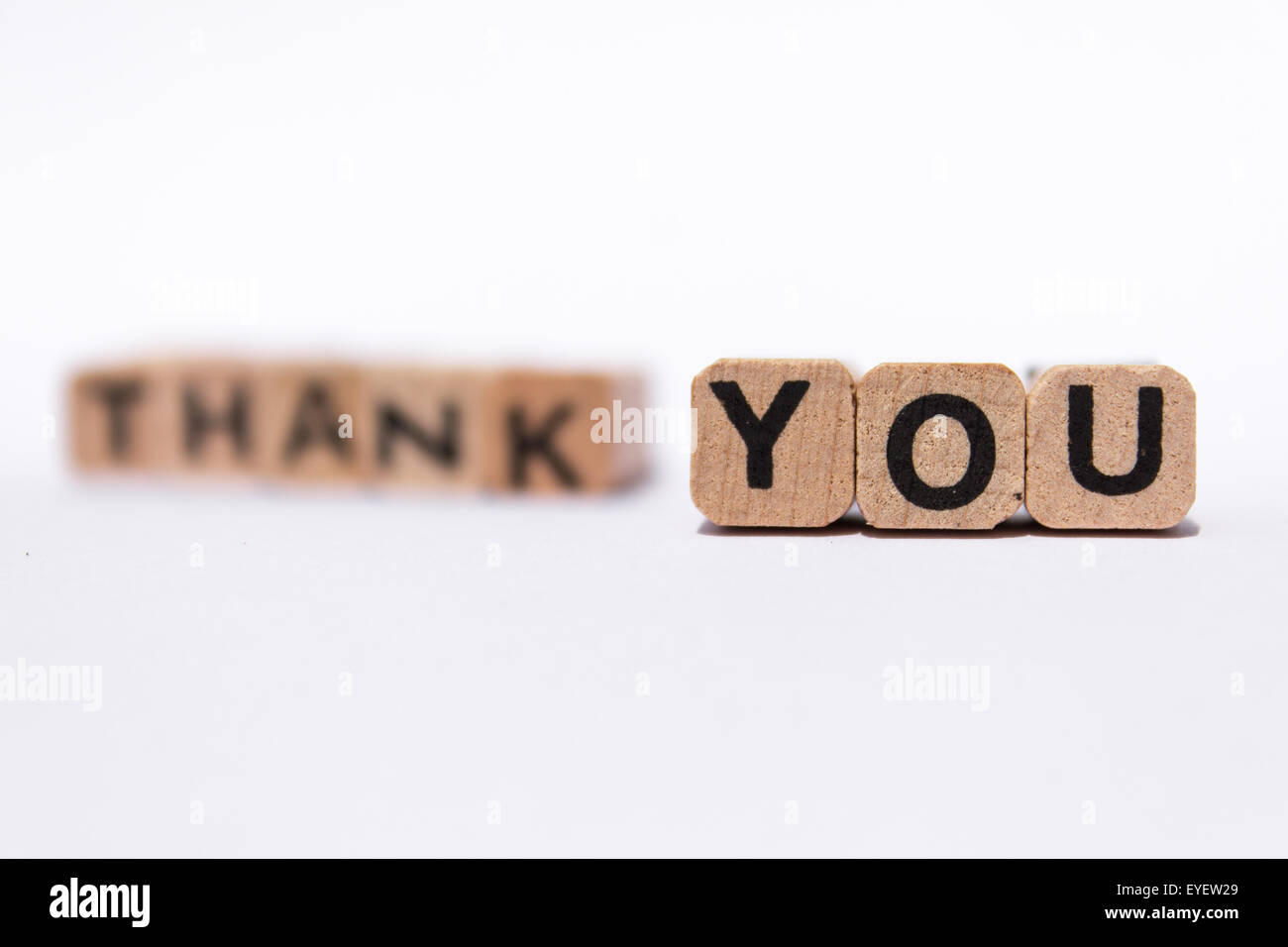 thank you text on wooden cubes on white background Stock Photo