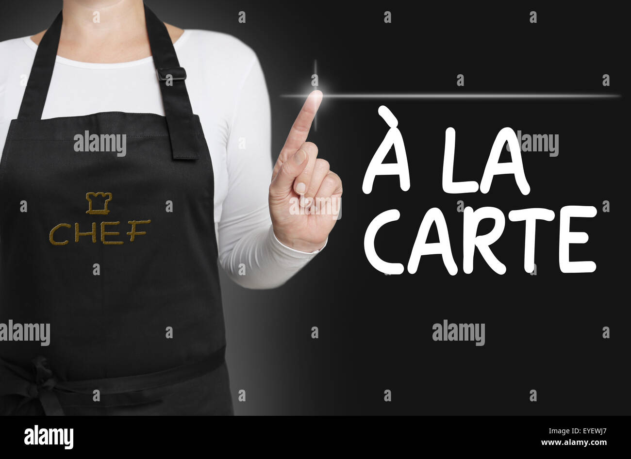 a la carte food touchscreen is operated by cook. Stock Photo