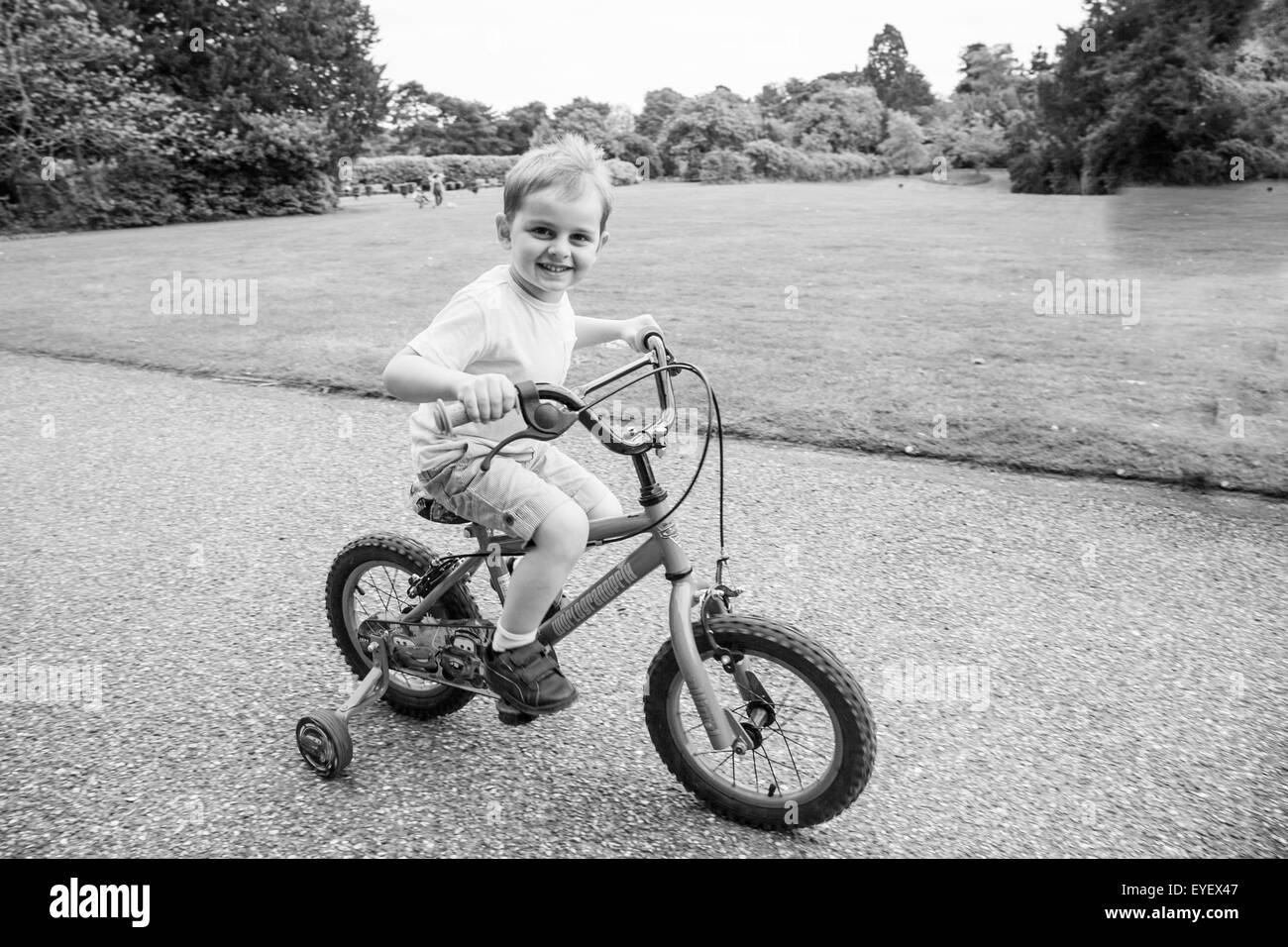 Kid cycling Stock Photo