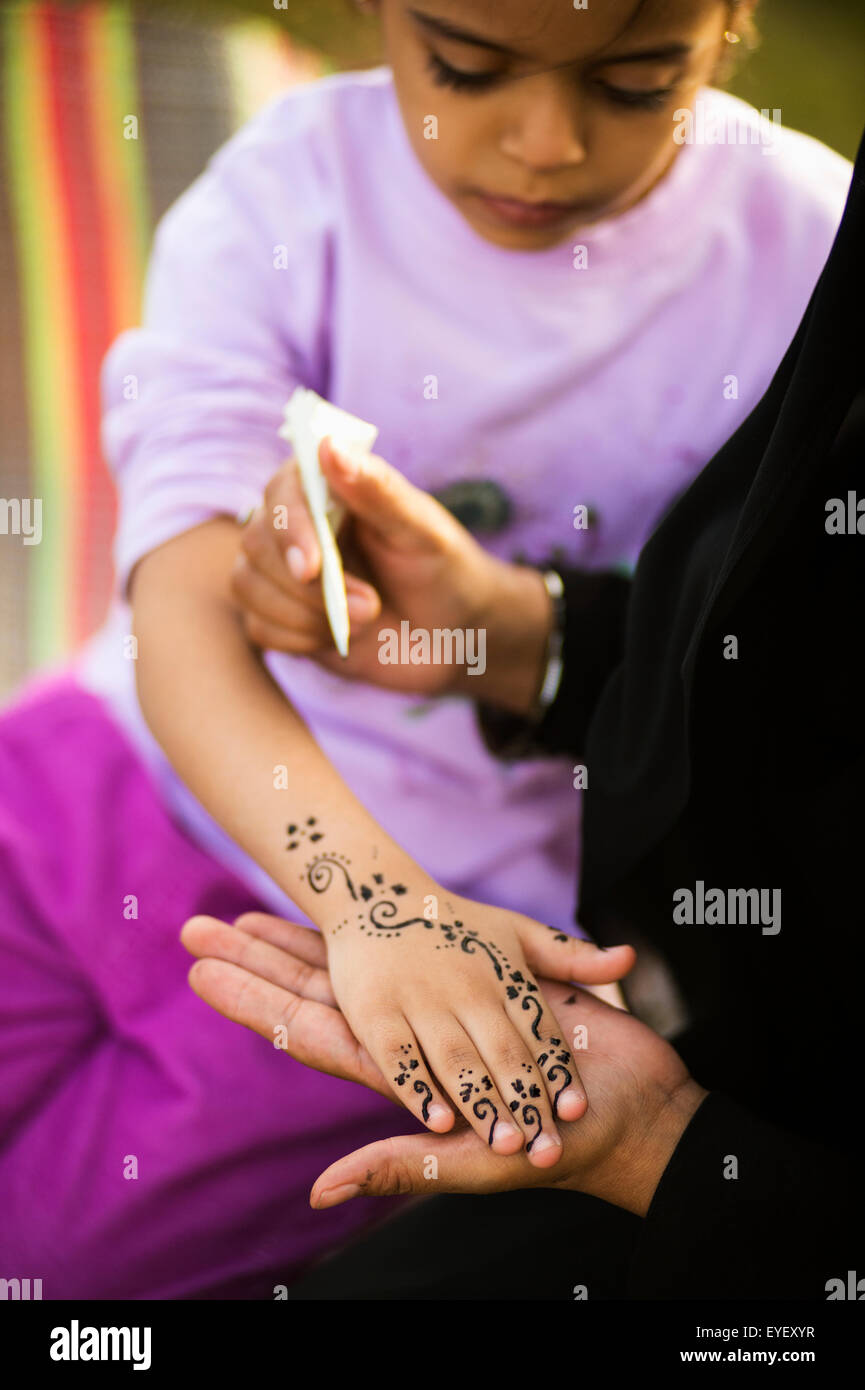 Young girl getting henna on her hand; Taif, Saudi Arabia Stock Photo Alamy