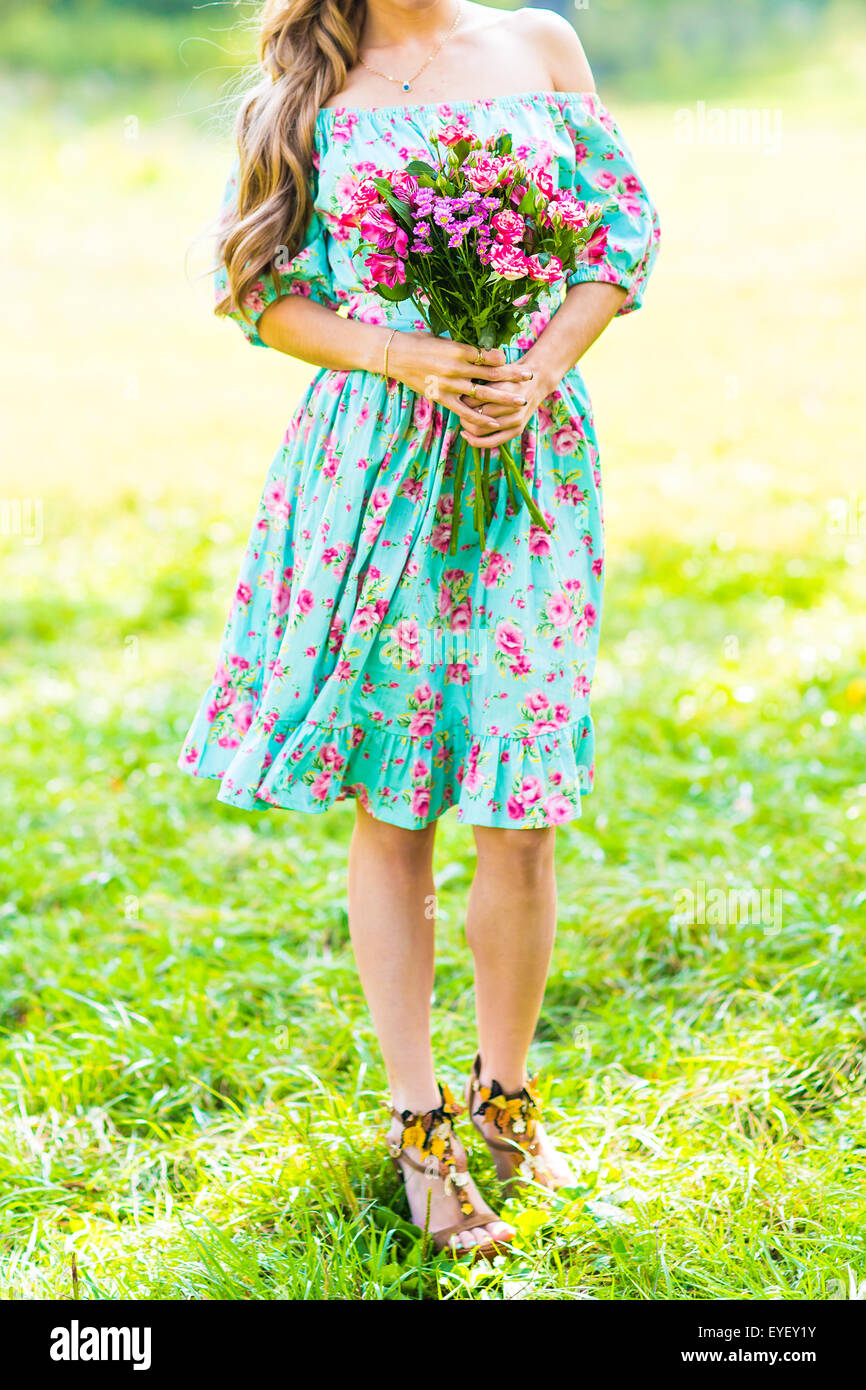 beautiful girl with a bouquet of flowers Stock Photo - Alamy