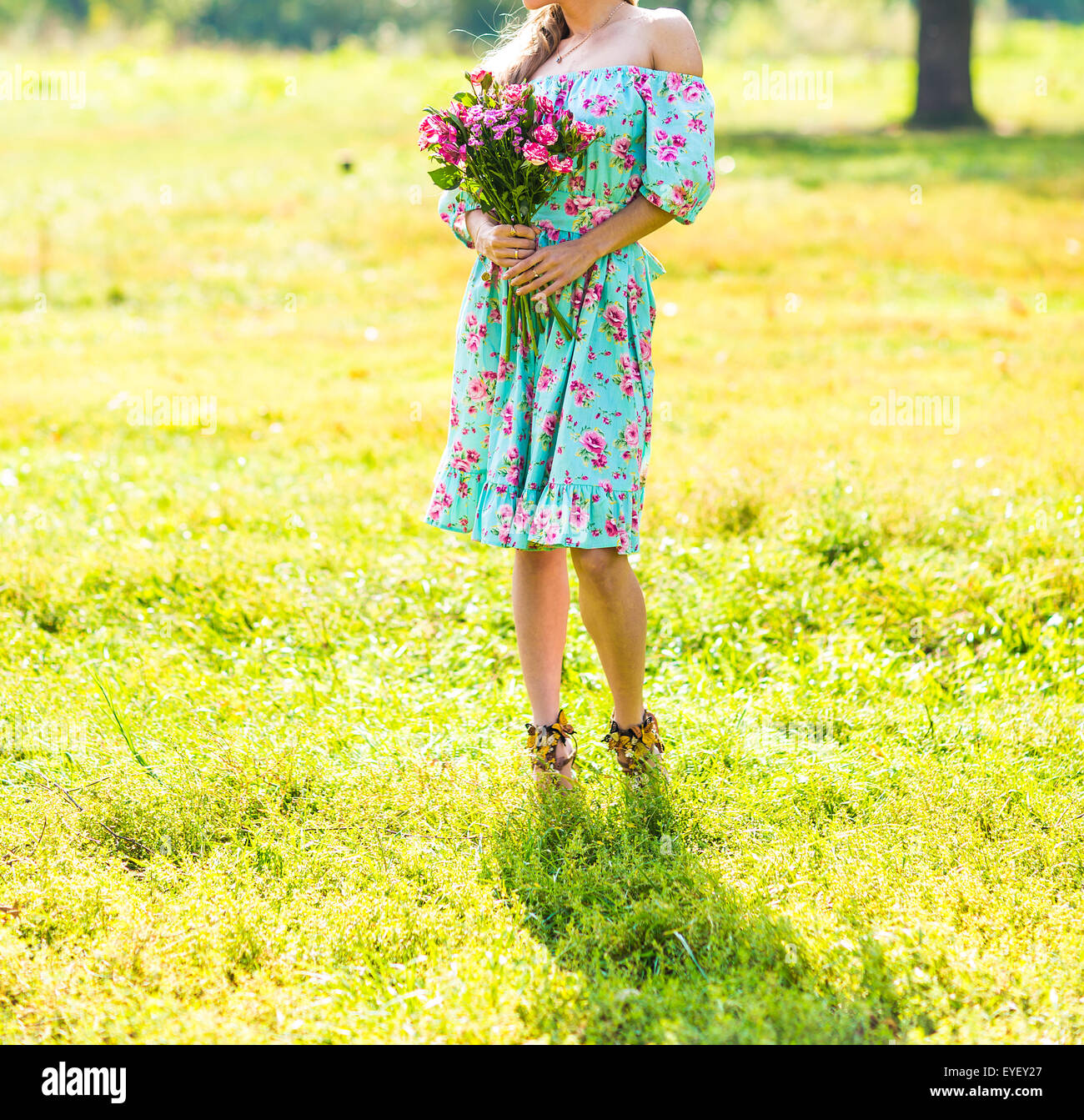 beautiful girl with a bouquet of flowers Stock Photo - Alamy