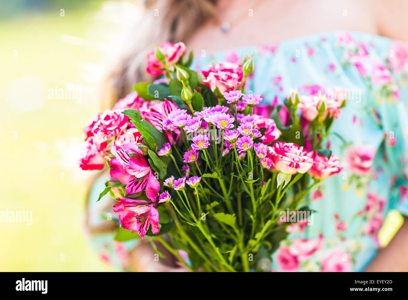beautiful girl with a bouquet of flowers Stock Photo - Alamy