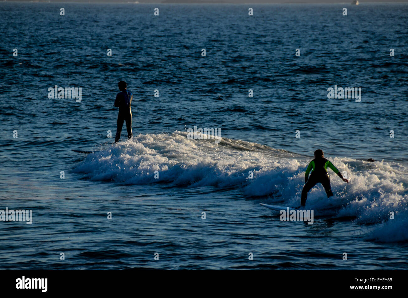 Silhouette Surfer at Sunset Stock Photo - Alamy