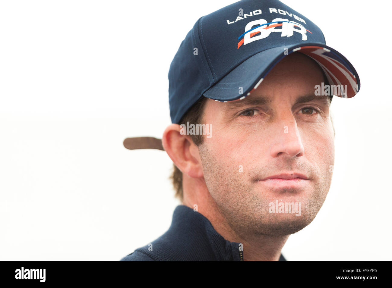 Sir Ben Ainslie reacts to questions from the media in Portsmouth at the start of the America's Cup World Series which runs until Stock Photo