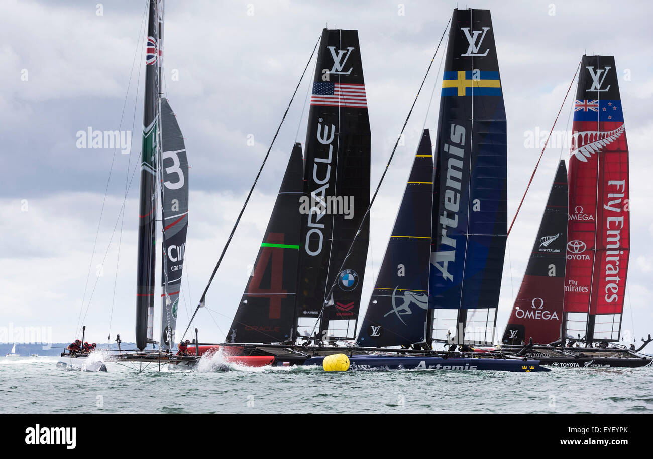 Sir Ben Ainslie's boat, Land Rover BAR, lead the fleet of AC45 foiling catamarans during an exhibition race off Portsmouth at th Stock Photo