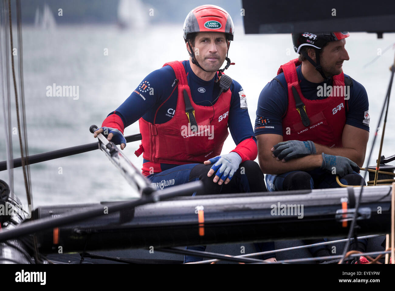 Sir Ben Ainslie at the helm of his AC45 foiling catamaran Land Rover BAR in Portsmouth at the start of the America's Cup World S Stock Photo