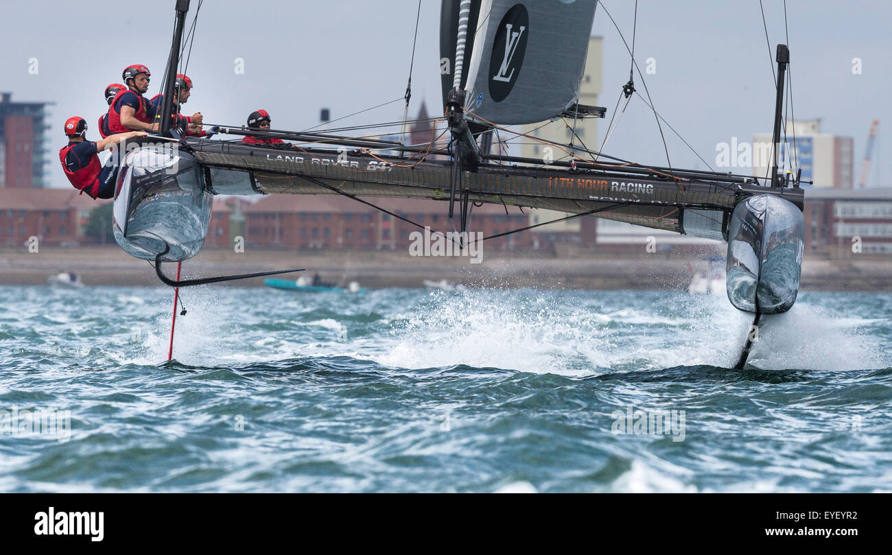Sir Ben Ainslie (fourth from left) at the helm of his AC45 foiling catamaran Land Rover BAR in Portsmouth at the start of the Am Stock Photo