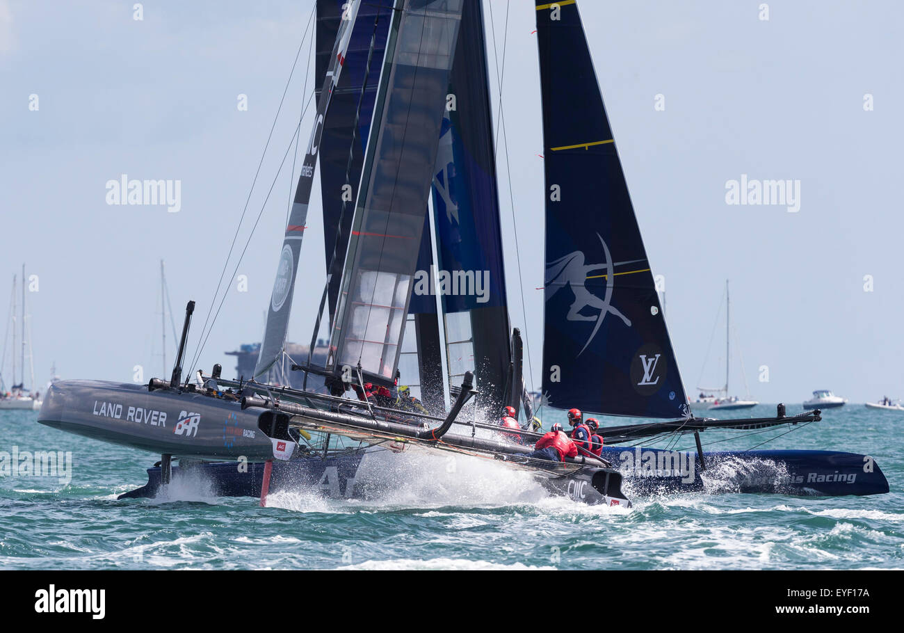 Sir Ben Ainslie racing his AC45 foiling catamaran on the Solent off Portsmouth during the first race for the America' Stock Photo