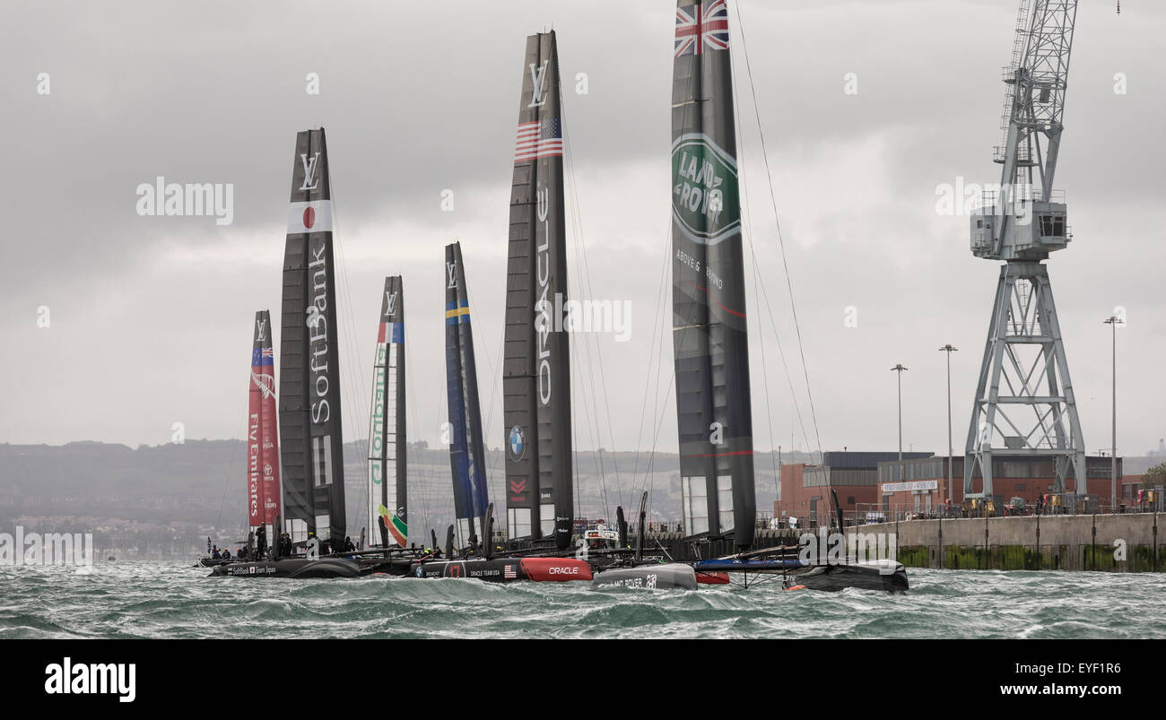 The six AC45 foiling catamarans of the America's Cup World Series sit in the relative safety of Portsmouth Harbour Stock Photo
