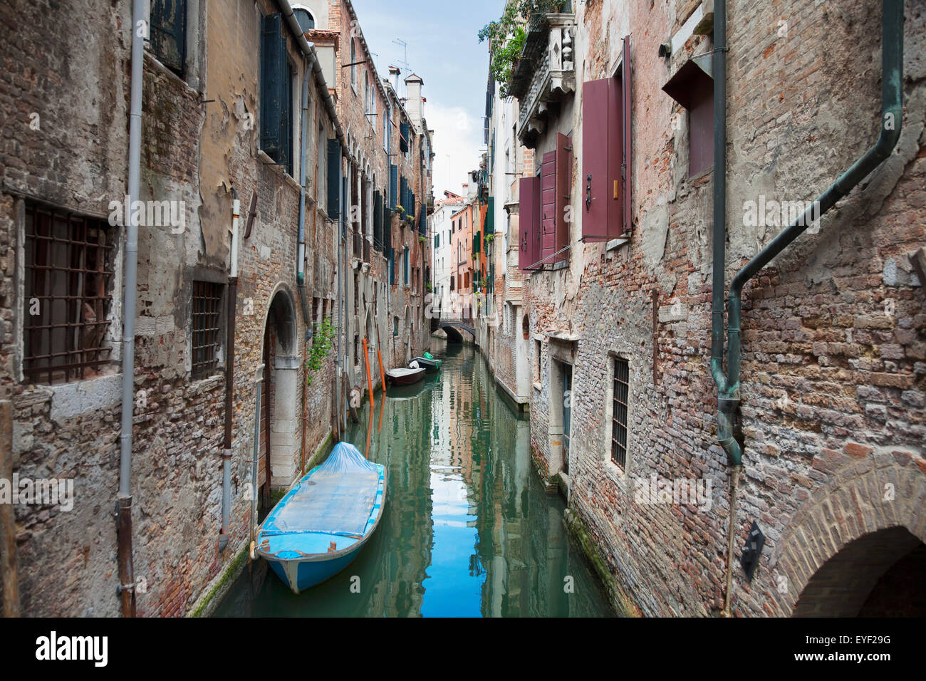 A small canal with boats; Venice, Italy Stock Photo - Alamy