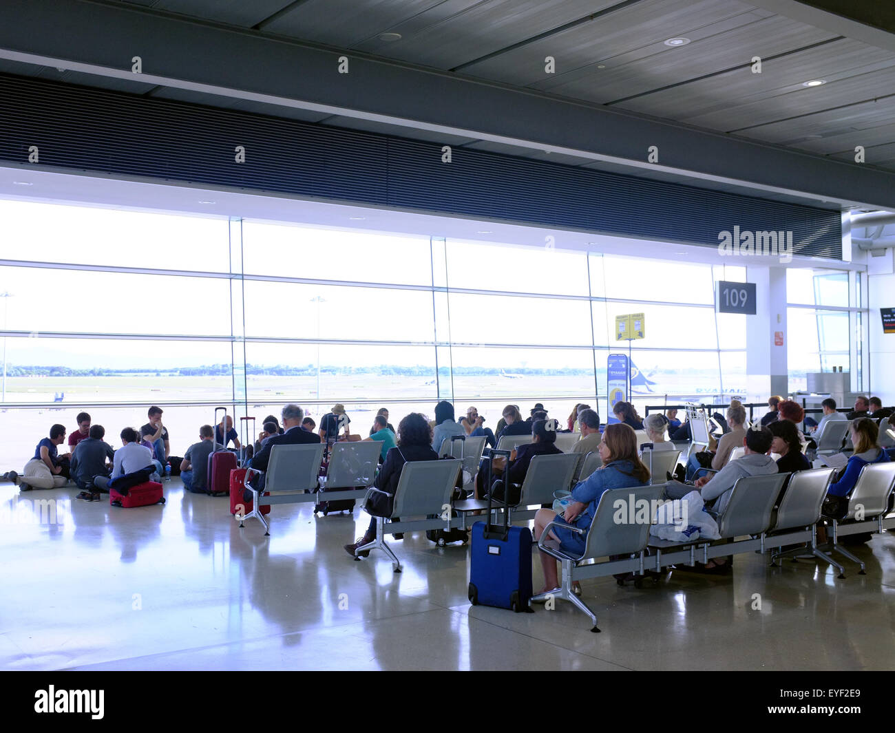 Passengers wait in a seating area inside Dublin Airport in Ireland