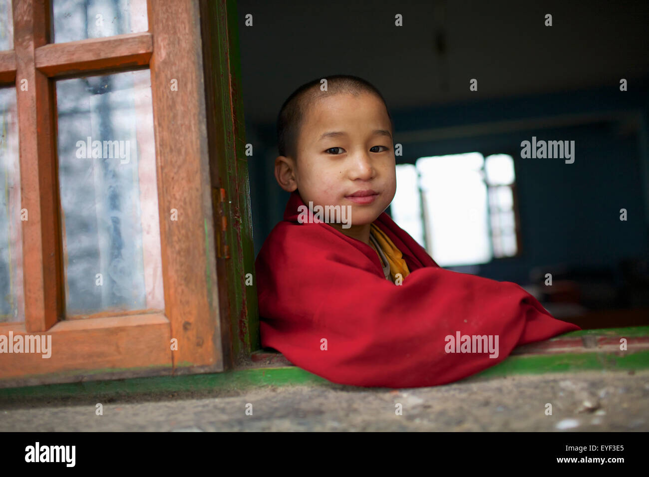 Novice monk at Rumtek Monastery; Gangtok, Sikkim, India Stock Photo