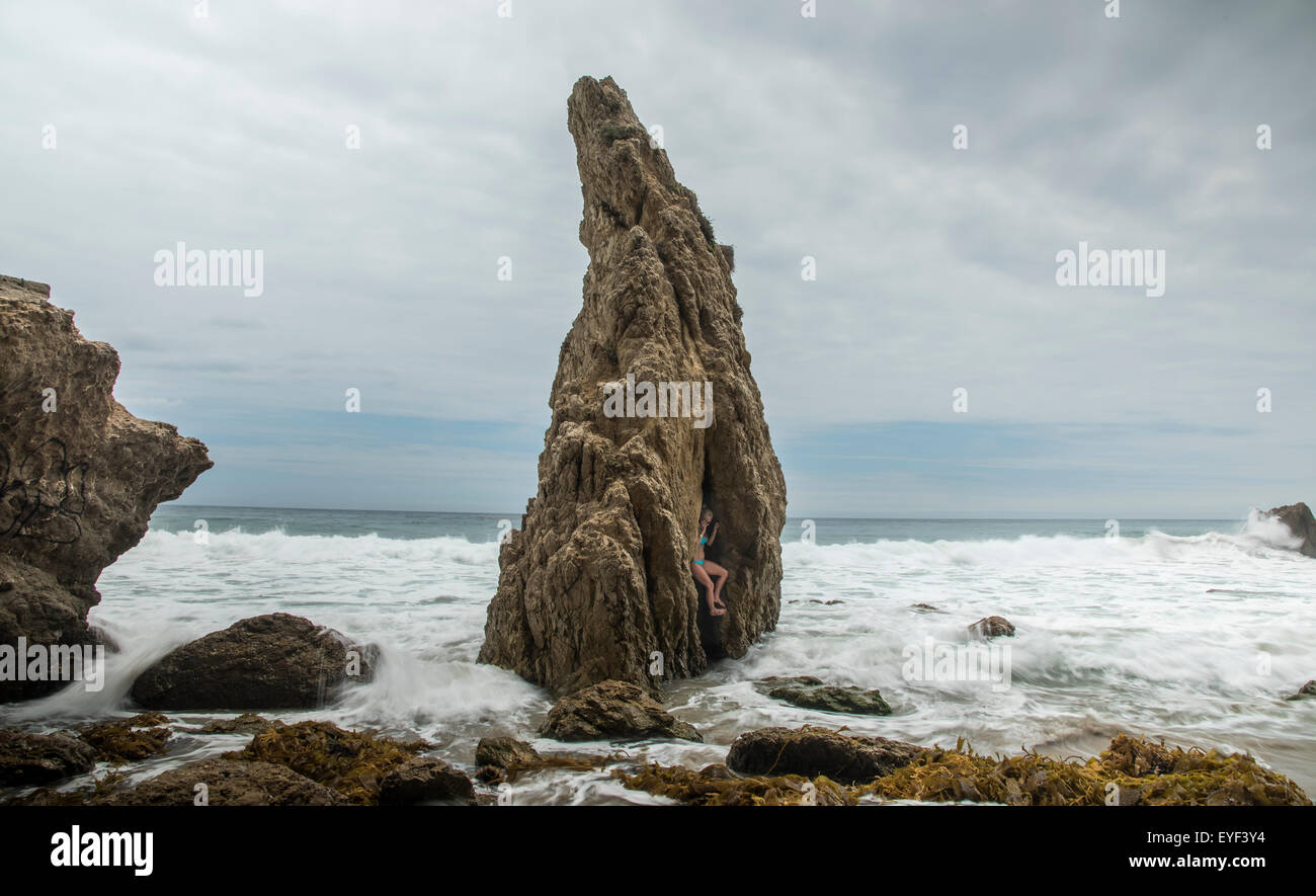 Faces in the Rock, a monolith on Matador Beach - Malibu Stock Photo