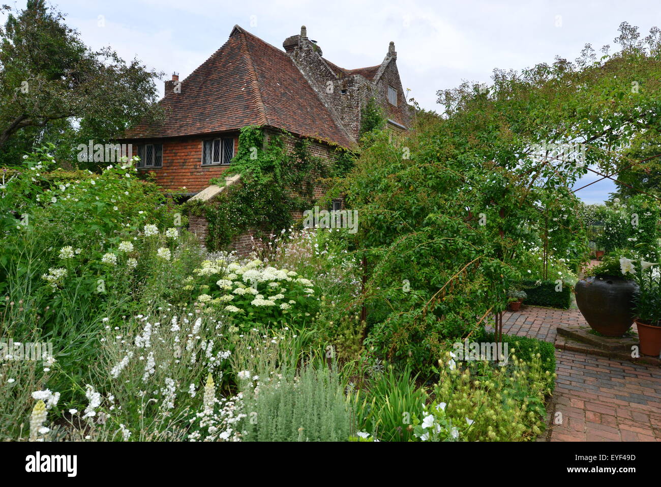 A well stocked overgrown garden in England Stock Photo Alamy